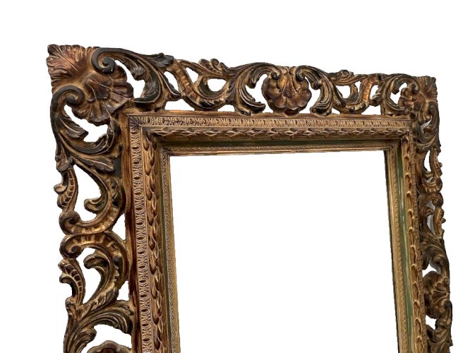 Miroir de style Napoléon III en bois sculpté XX siècle