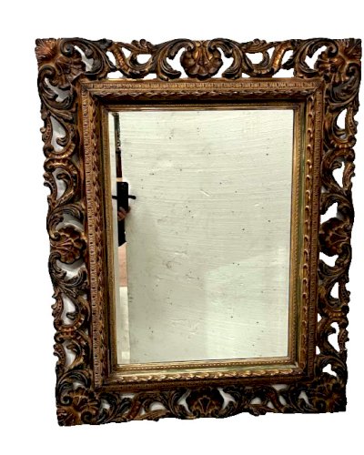 Miroir de style Napoléon III en bois sculpté XX siècle