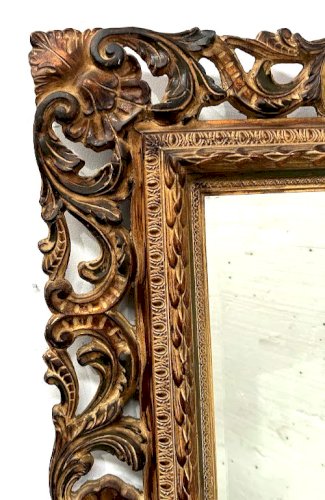 Miroir de style Napoléon III en bois sculpté XX siècle