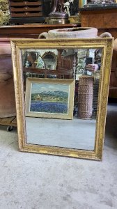 19th CENTURY GOLDEN WOOD MIRROR WITH PALMETTES