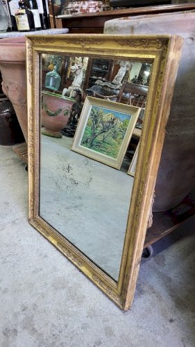 MIROIR EN BOIS DORE A PALMETTES DU XIX ème SIECLE