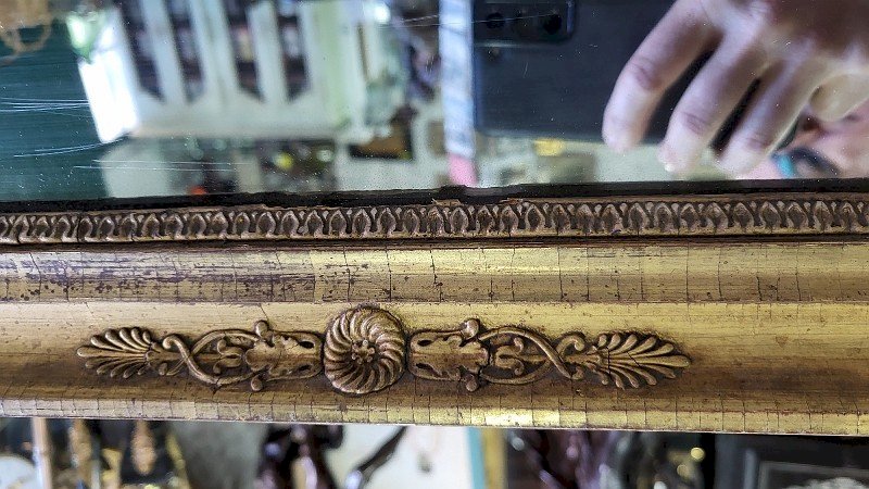 MIROIR EN BOIS DORE A PALMETTES DU XIX ème SIECLE
