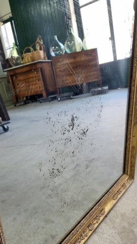 MIROIR EN BOIS DORE A PALMETTES DU XIX ème SIECLE