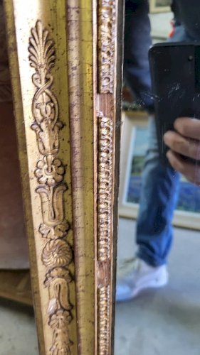 MIROIR EN BOIS DORE A PALMETTES DU XIX ème SIECLE
