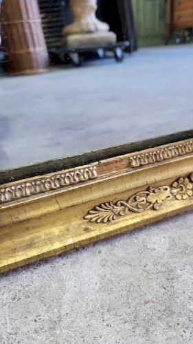 MIROIR EN BOIS DORE A PALMETTES DU XIX ème SIECLE