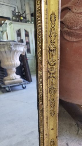 MIROIR EN BOIS DORE A PALMETTES DU XIX ème SIECLE