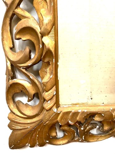 Miroir en bois doré a sculpture ajourée XIX siècle