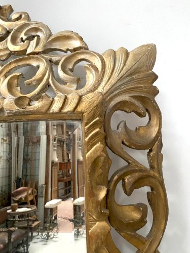 Miroir en bois doré a sculpture ajourée XIX siècle