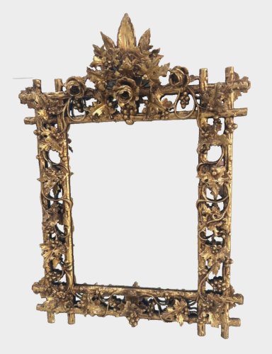 Miroir en bois sculpté et doré XIX siècle