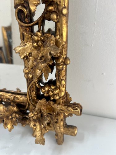 Miroir en bois sculpté et doré XIX siècle