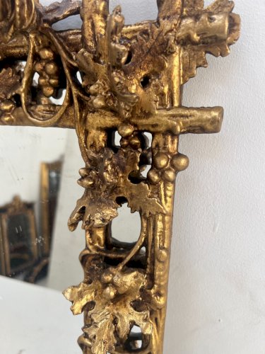 Miroir en bois sculpté et doré XIX siècle
