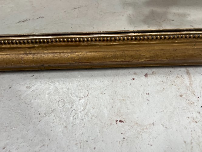 Miroir Louis Philippe en bois et stuc doré XIX siècle