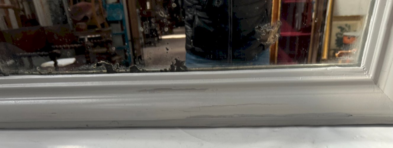 Miroir Louis Philippe en bois et stuc patiné XIX siècle