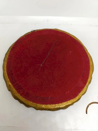 miroir rond cadre moulé doré à décor de volutes et feuillages en bon etat