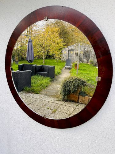 Miroir rond en palissandre