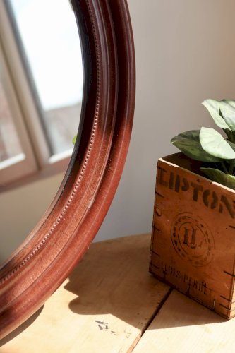 Miroir rond vintage cadre effet bois acajou