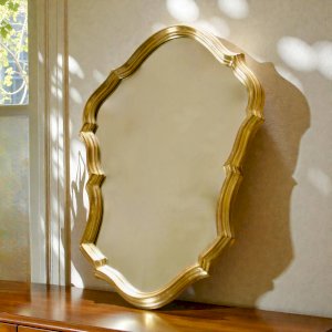 Vintage Belgian wooden mirror in gilded scalloped shape