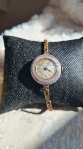 Montre ancienne émaillée art déco plaqué or