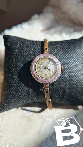 Montre ancienne émaillée art déco plaqué or