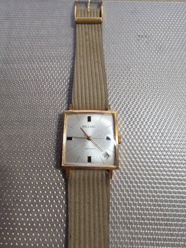 Montre ancienne mecanique  Relliac ,  bel etat ... calendrier