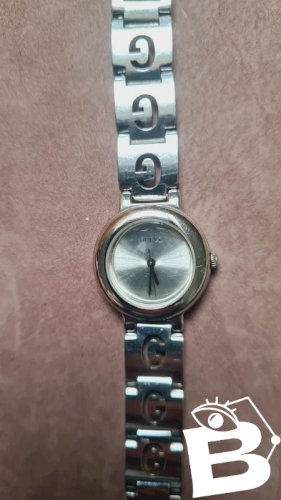 Montre GUESS femme ( révision à prévoir )