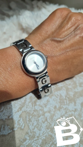 Montre GUESS femme ( révision à prévoir )