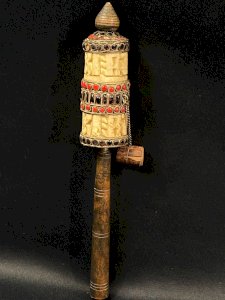 Tibetan prayer mill with sculpted decoration enhanced with beads Tibet Nepal Buddhism