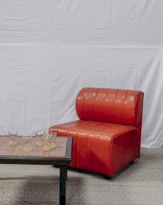 Olivia, the driver in red vinyl No. 62