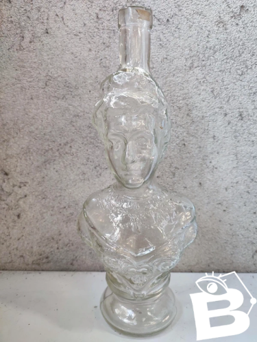 original bouteille en verre moulé debut 20eme siecle en forme de buste feminin en bon etat
