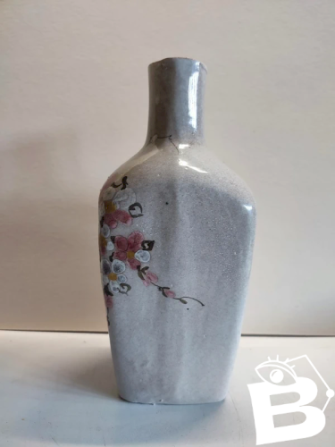 Original vase bouteille à decor floral Art et ceramique signé en bon etat