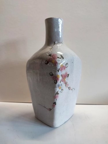 Original vase bouteille à decor floral Art et ceramique signé en bon etat