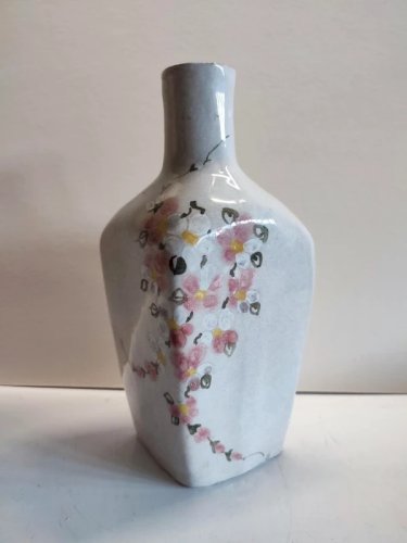 Original vase bouteille à decor floral Art et ceramique signé en bon etat