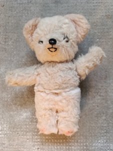 Vintage teddy bear in fair condition.