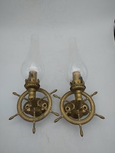 Pair of marine wall sconces in solid brass.