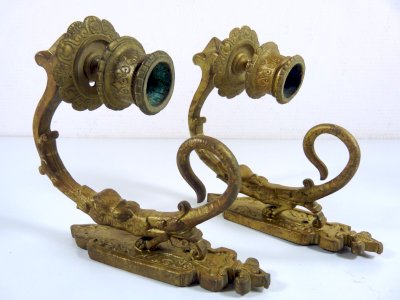 Pair of antique sculpted bronze wall sconces from the 19th century, featuring dragon decor, signed G.H.