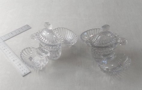 Pair of vintage glass condiment servers