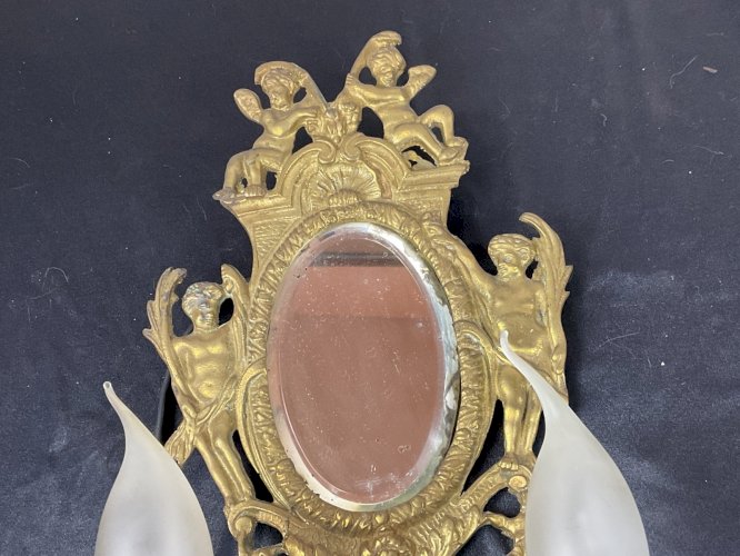 Paire d'appliques avec miroirs bisautés. Putti . Bronze. Napoléon III