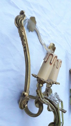 Paire d'appliques en bronze et verre bombé