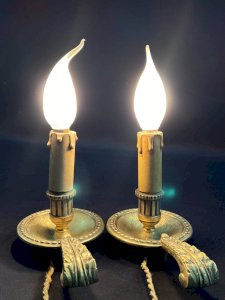 Pair of rat-style bronze candlesticks in Louis XVI style mounted as lamps.