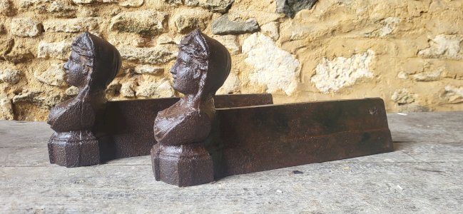 Pair of cast iron andirons from the 19th century