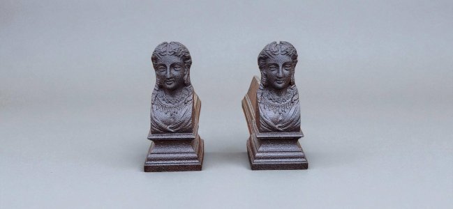 Paire de chenets en fonte