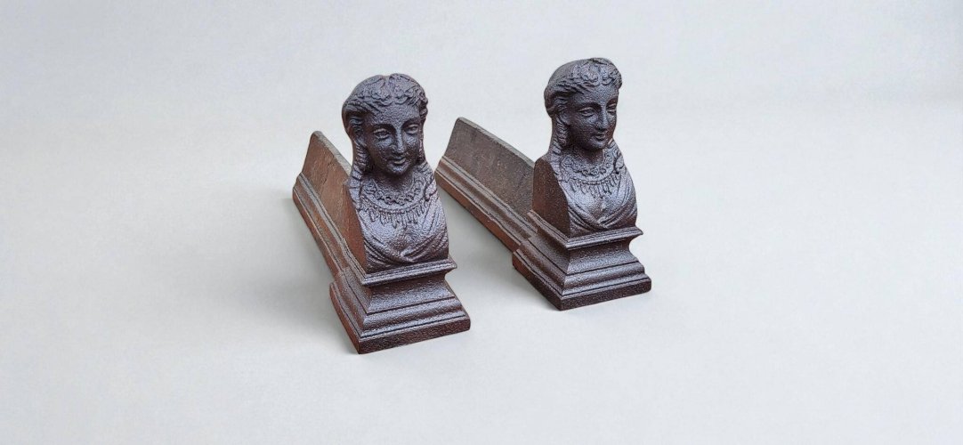 Paire de chenets en fonte