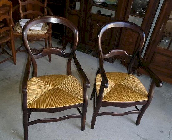 PAIRE DE FAUTEUILS LOUIS PHILIPPE EN NOYER PAILLE DOREE