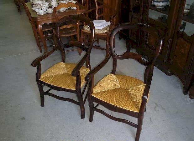 PAIRE DE FAUTEUILS LOUIS PHILIPPE EN NOYER PAILLE DOREE