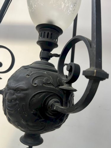 Paire de lustres boules en bronze patiné XIX siècle