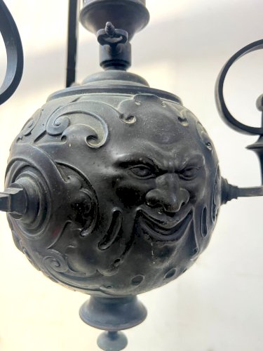 Paire de lustres boules en bronze patiné XIX siècle