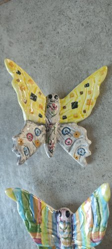 Paire de Papillons en Céramique signée.