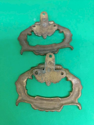 paire de poignee ancienne en bronze à decor dange en bon etat