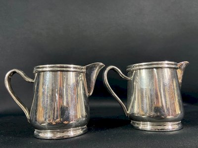 Pair of hotel silver-plated creamers