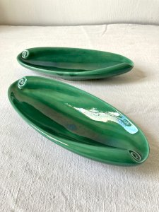 Pair of glazed ceramic dishes in emerald green with swirls, 1950s-1960s.